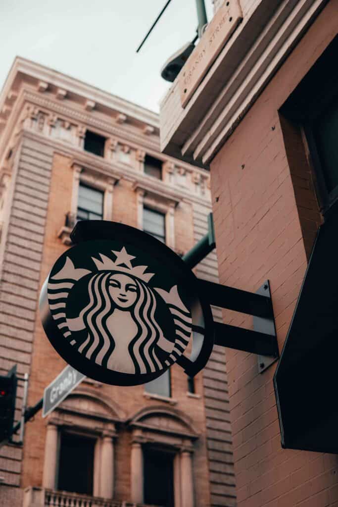 Starbucks store logo on the side of a building.
