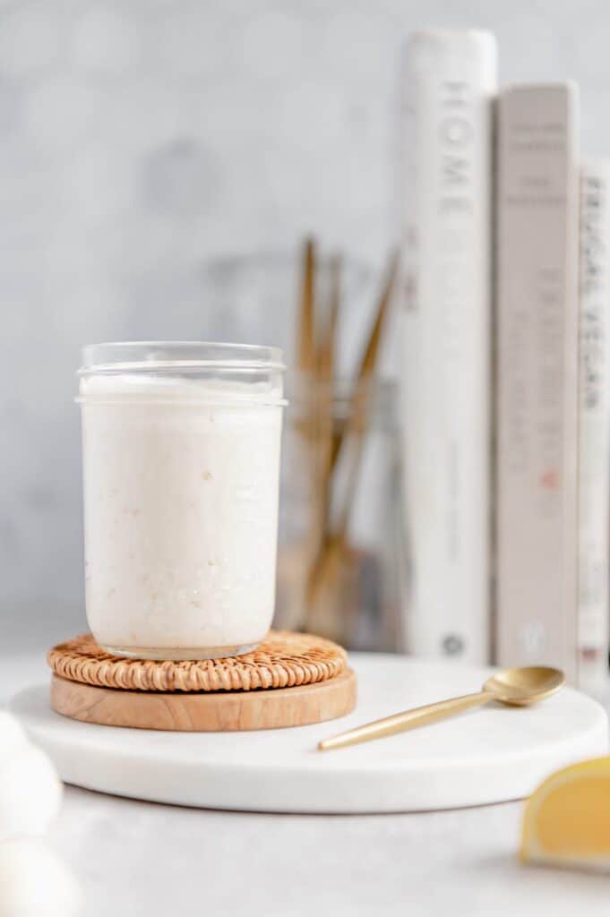 Vegan lemon garlic dipping sauce in a mason jar.