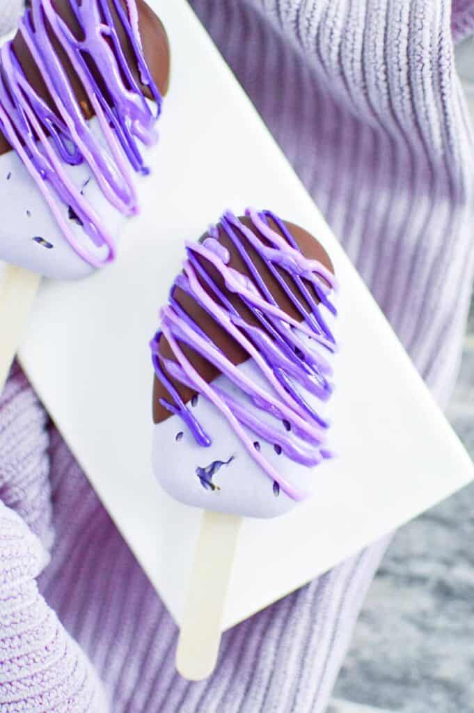 Flat lay of beautifully purple lavender ice cream popsicles.