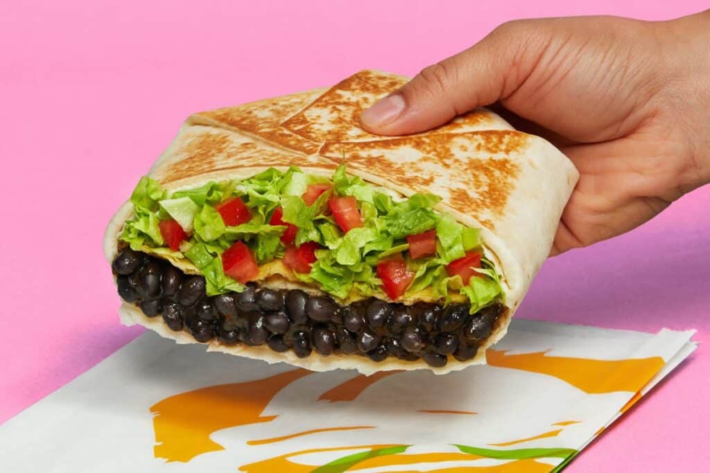 Black bean Crunchwrap supreme fresco style from Taco Bell that is exactly how to order vegan at Taco Bell.