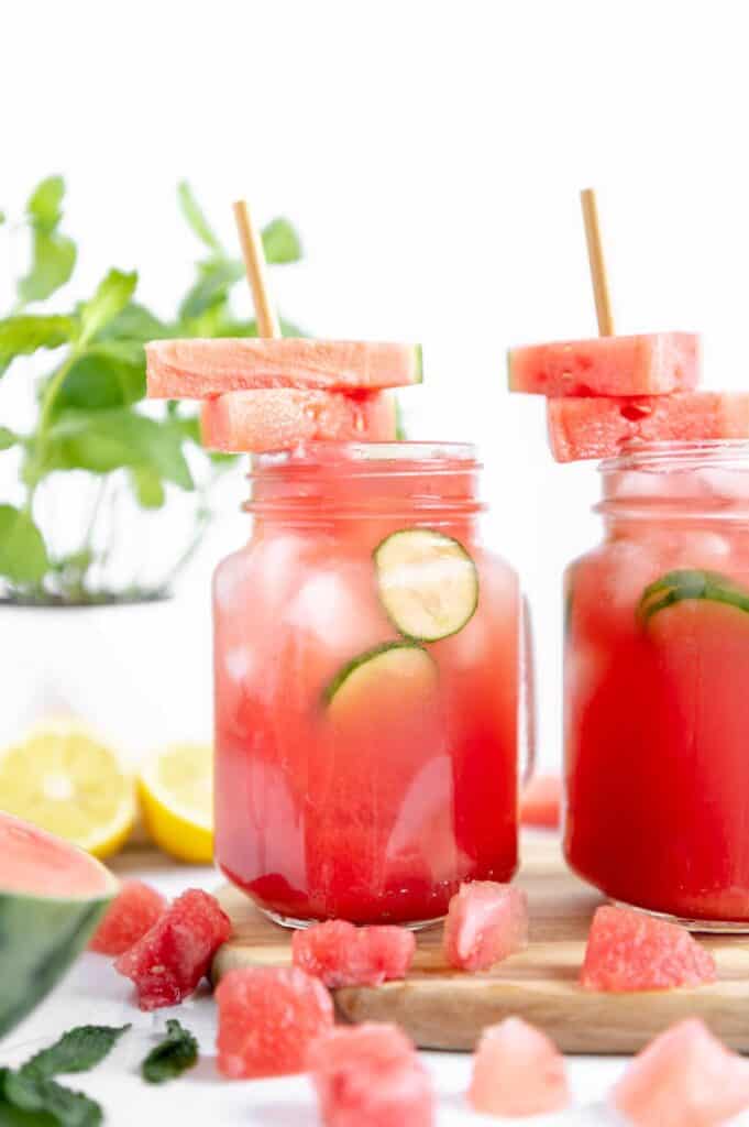 Refreshing watermelon drink with mint in the background.