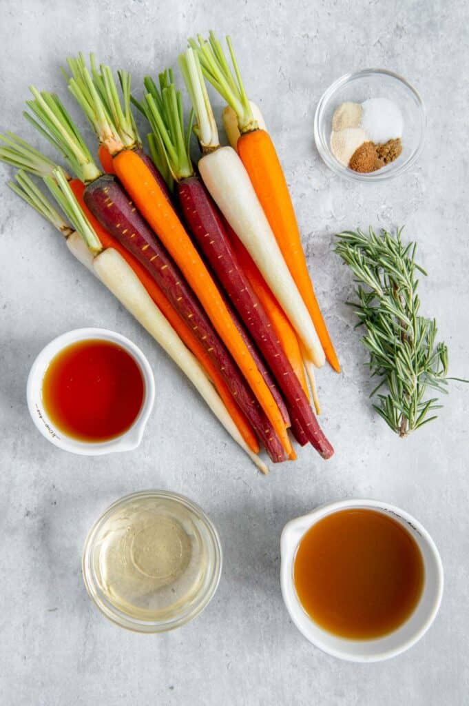 Flat lay of ingredients to make vegan maple roasted carrots.