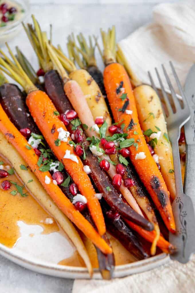 Detail photo showing the garnished maple glazed carrots.