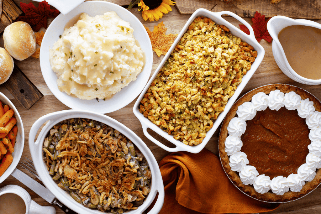 Overhead of a Thanksgiving table spread.