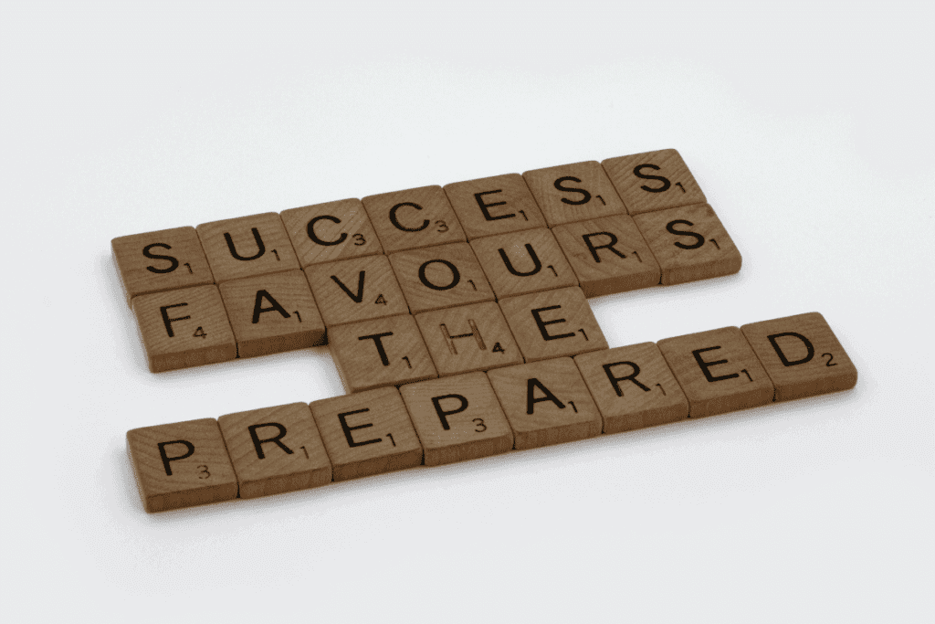 Scrabble letters spelling out the phrase "success favors the prepared."