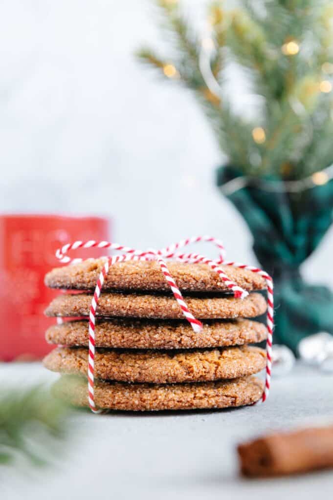 A stack of ginger cookies tied up with red and white twine.