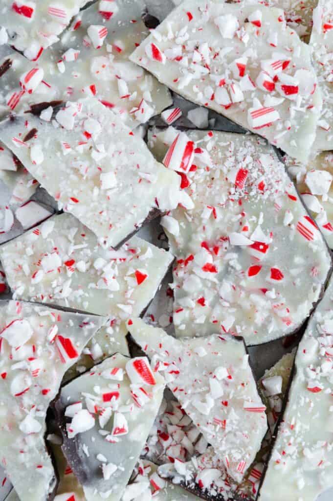 Peppermint bark pieces stacked on top of one another.