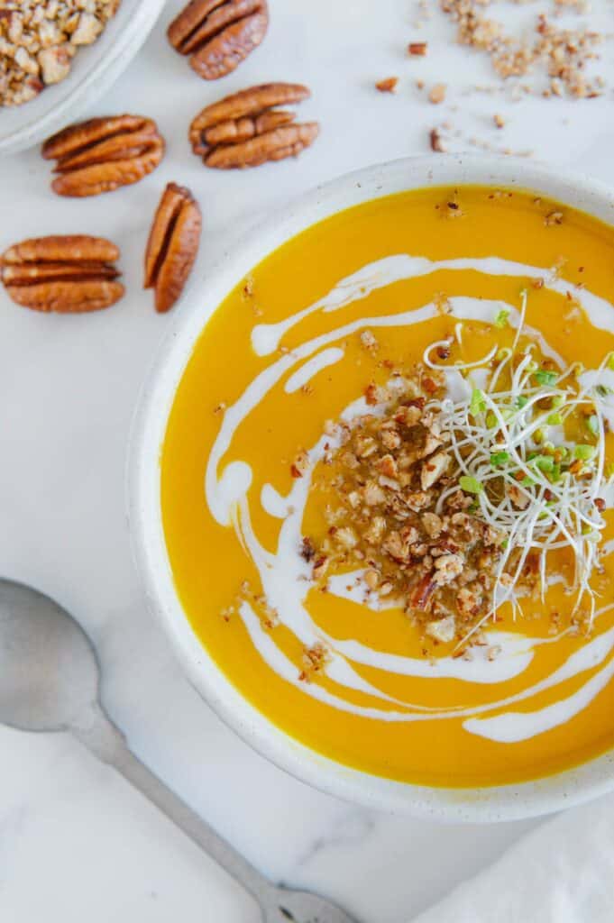 A butternut squash soup with a coconut swirl.