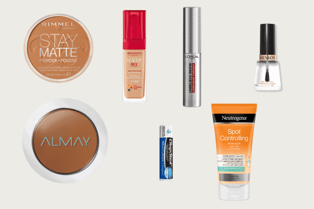 Different makeup products on a plain background.