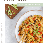 Vegan pineapple fried rice Pinterest graphic with imagery and text.
