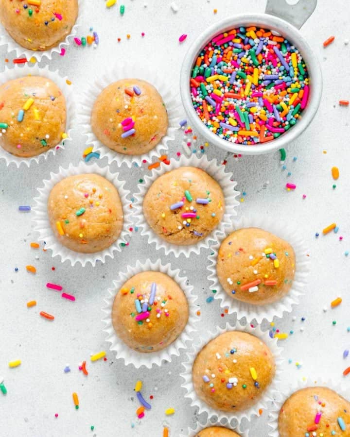 Cake bites in mini muffin liners with sprinkles.