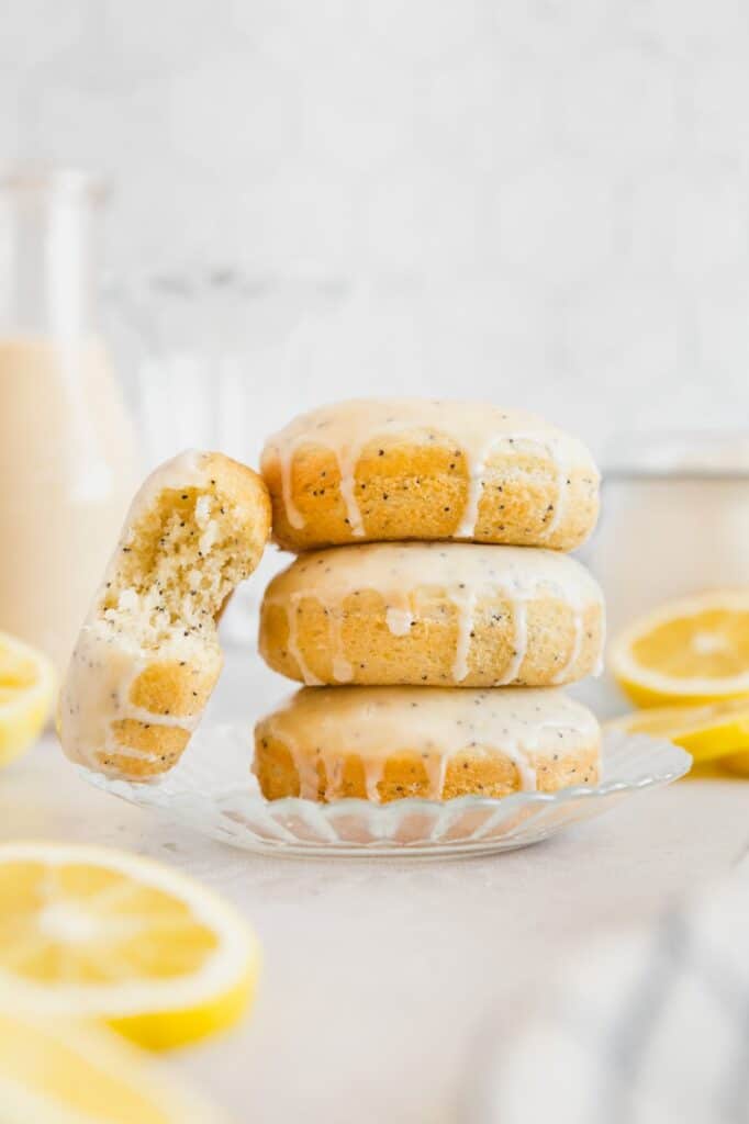 A stack of baked crumb-y lemon donuts.