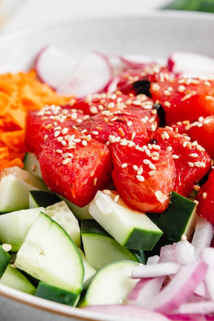 Upclose of roasted watermelon tuna sprinkled with sesame seeds.