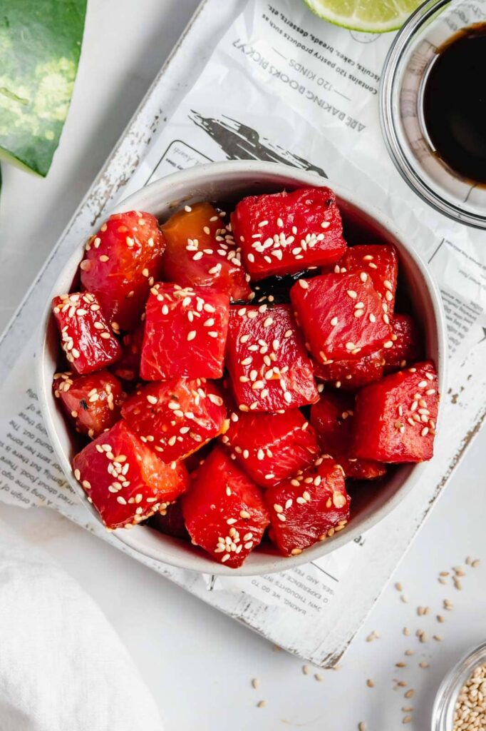 Watermelon tuna with sesame seeds in a serving bowl.
