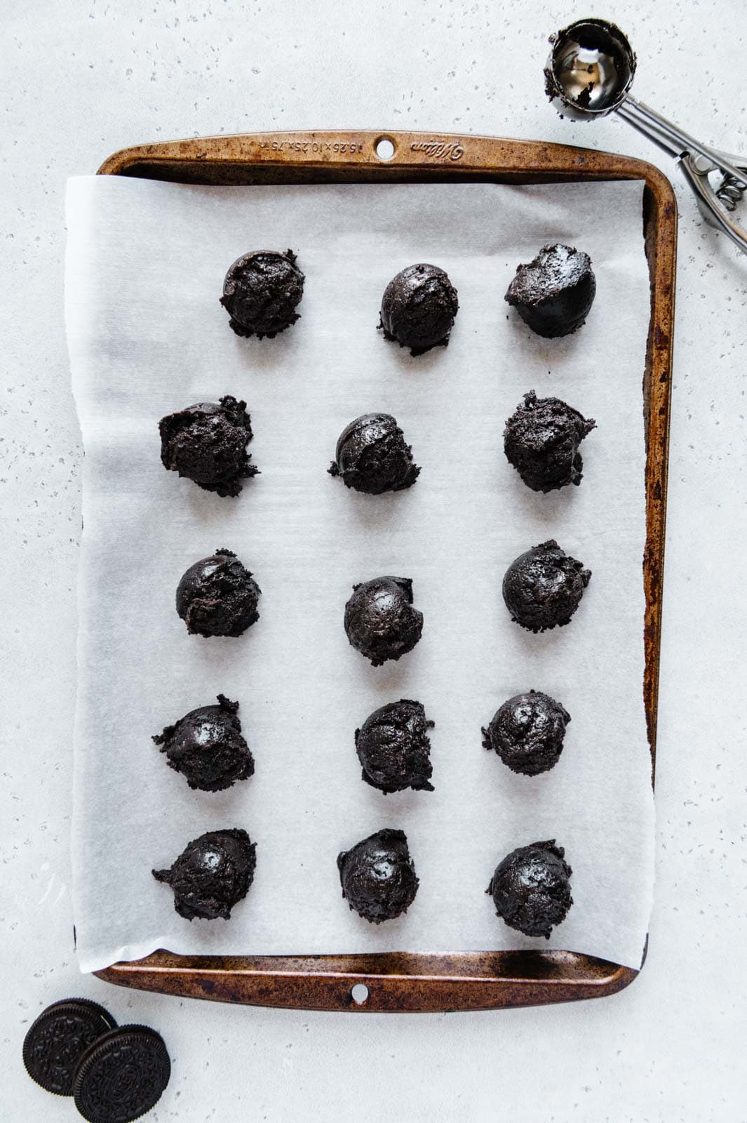 Oreo truffles scooped by a 1.5 teaspoon retractable cookie scoop.