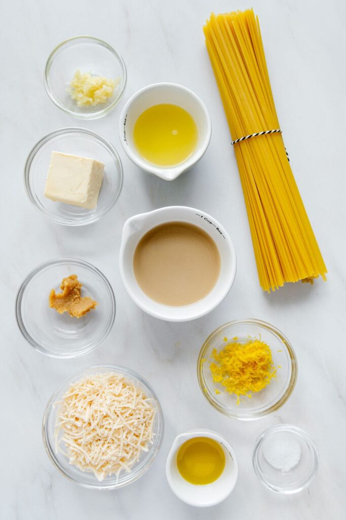 Ingredients to make a creamy vegan pasta al limone