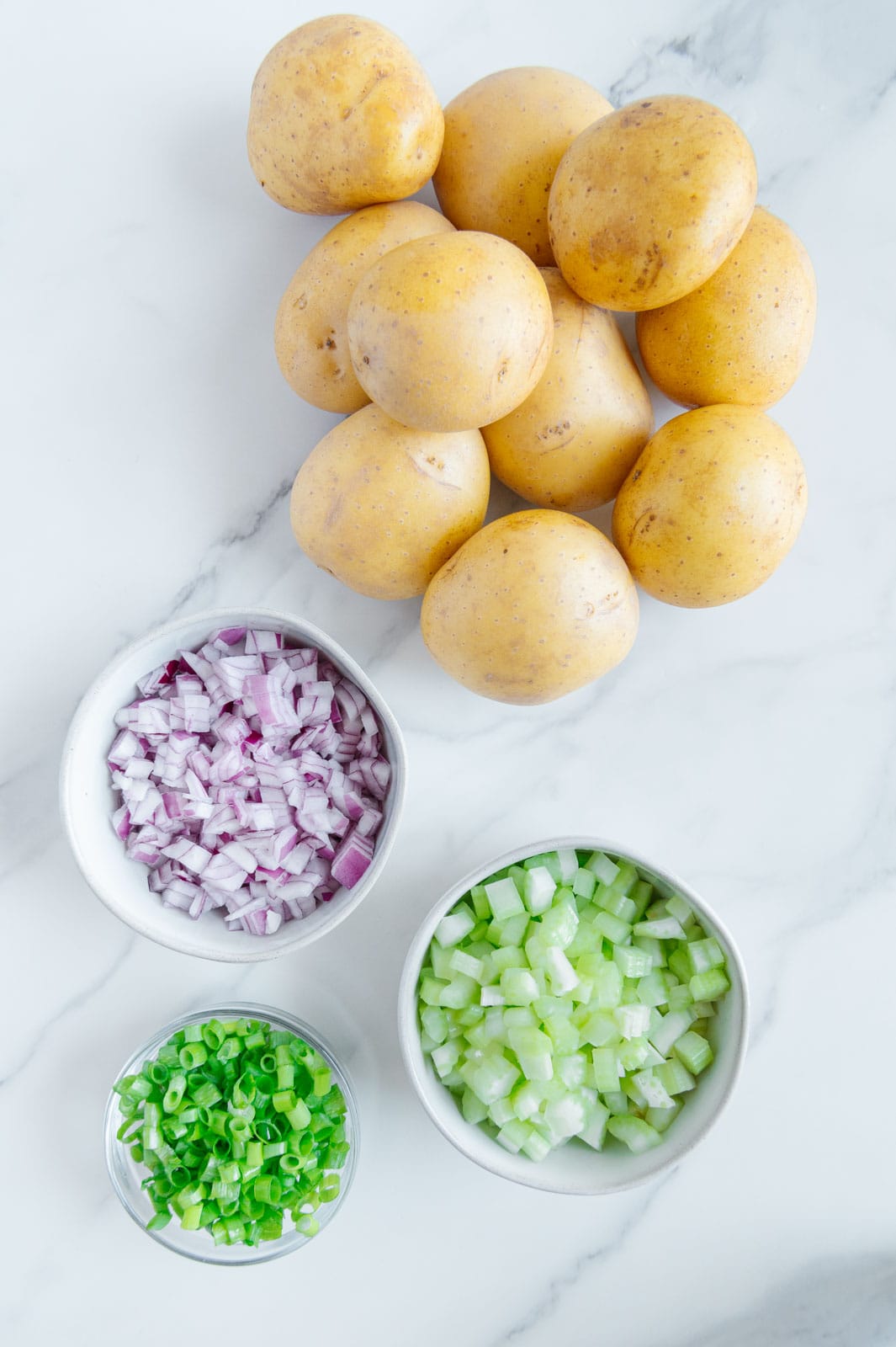 Ingredients to make a vegan potato salad.