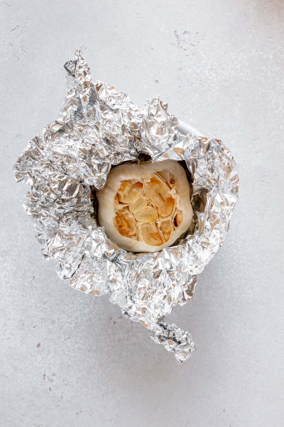 Finished roasted garlic in foil.