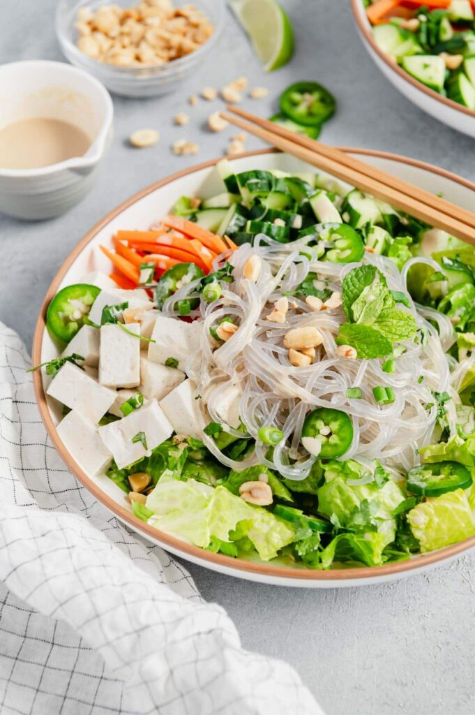 A tofu Asian glass noodle salad filled with veggies.