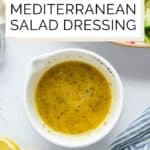 Vegan Greek salad dressing Pinterest graphic with imagery and text.